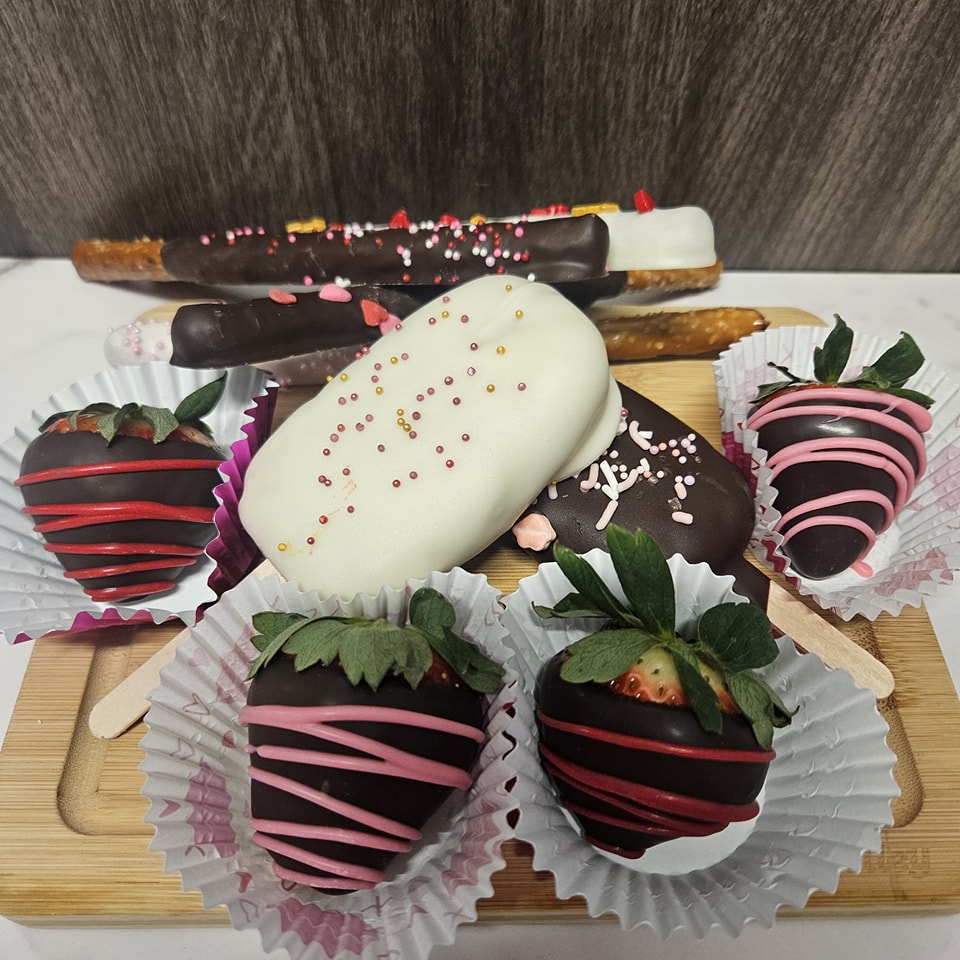 Well well well....have we got a weekend planned for you! Our cases will be brimming with love (and treats) tomorrow and Saturday! If you're in the mood to celebrate Valentine's Day, we've got you covered (in chocolate). If you want to say "Helloooo snow", we made a few snowflake sugar cookies just for the occasion. If you need a sweet (or savory) pick-me-up, say no more! Give the menu a thorough read as we have several items you don't see every weekend and won't want to miss!
We'll do our best to keep items stocked for both Friday and Saturday. Can't wait to see you all tomorrow! ❤️
First, let's start with our Valentines Day specials and then we'll cover the rest of the menu:
❤️Chocolate Dipped Strawberries
🩷Chocolate Dipped Pretzels
💜Cakesicles (chocolate and vanilla available)
❤️Specialty Cake Slice: Chocolate 'Entremet' Cake (layers of chocolate cake, chocolate mousse, strawberry compote and almond crunch with a chocolate mirror glaze)
🩷10-Pack Assorted Housemade Chocolate Bon Bons (10 different flavors in each box)
💜Extra Large "XO" sugar cookie boxes
Muffins: Cherry Cheesecake, Caramel Macchiato
Cheesecake: Vanilla Mini, White Chocolate Strawberry, French Silk Brownie
Pie Slice: Lemon Cream
Breakfast: Bacon Cheddar Jalapeño Beer Bread
Cookies: Chocolate Chip, Decorated Sugar, Raspberry Linzer, Gluten/Dairy Free Chocolate Chip & Snickerdoodle
Cupcakes: Triple Chocolate, Vanilla, Carrot, "Love Stinks" Vanilla w/ Chocolate, Red Velvet, Persian Love Cupcake (pistachio and cardamom), Allergen Friendly
Macarons: Blackberry & Cream, Salted Caramel, Cherry Starburst
Bars: Fudgy Brownie, Cranberry Lime Bar (made like a lemon bar), Peanut Butter Bars
Quiche: Bacon Cheddar Potato, Mushroom & Swiss, Steak Gorgonzola Onion
Granola: Cinnamon Pecan, Blueberry Vanilla, Cherry Almond
Other Treats: Chex Mix, Candied Nuts
Dog & Cat Treats
❤️❤️ Bonus - there will be two (just two) whole 6" Chocolate Strawberry Entremet Cakes available for purchase. So if a single slice just won't cut it, come in and grab a whole one to share with your family. ❤️❤️