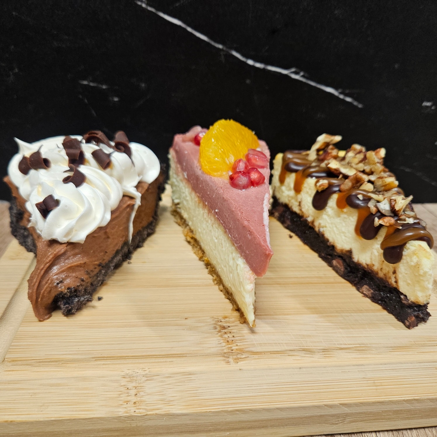 We'll be seeing a little bit of rain and clouds over the next few days, making it feel a little bit more like fall. We're still trying to keep the balance of summer with autumn vibes around here though.
As always, plenty to absorb with this weekends menu! We'll continue caramel apples for the foreseeable future (it's not really fall without them!) and some fun items are making a return appearance (banana pudding parfait anyone?). Did you come in last weekend and we had run out of Caramel Apple Chex Mix? Fear not! We've restocked! 🫶
We look forward to seeing you this weekend!
🫐 Muffins | Blueberry Streusel
🥓 Quiche | Bacon Caramelized Onion Fig Goat Cheese • Roasted Tomato Mozzarella • Sausage Mushroom Onion
🧀 Scone | Bacon Cheddar Chive
🥮 Danish | Maple Pecan Cream Cheese
🍰 Cheesecake | Vanilla Mini • Pomegranate Orange • Turtle Brownie
🥧 Slice: French Silk
🍪 Cookies | Chocolate chip • Snickerdoodle • Kitchen Sink (pretzels, heath, butterscotch, potato chips) • GF/DF Choc Chip • GF/DF Snickerdoodle
🧁 Cupcake | Triple chocolate • Vanilla • Carrot • GF Carrot • Allergen-friendly • Lemon Raspberry Cheesecake • Chocolate Cherry Coke • Pumpkin Chai Spice
🏈 Bars | 7-Layer Bar (Magic Bars) • S'mores Chocolate Chip Bar • Peanut Butter Footballs
☕️ Macarons | Raspberry Pistachio • Birthday Cake • Blackberry n Creme
🌰 Snacks | Caramel Apple Chex Mix • Chex Mix • Candied Nuts
🍌 Parfait | Banana Pudding
🥣 Granola | Blueberry Vanilla • Pumpkin Spice
🍏 Other | Caramel Apples - Plain, Sprinkles, Peanut and Reeses Pieces
Doggo treats and muffins