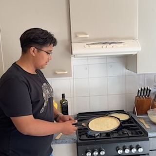 After a day touring Utah Beach and the American western sector, students from #arrupejesuithighschool make crepes for dessert tonight.