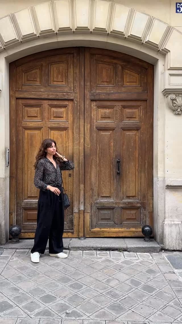 This pure silk blouse and linen trousers were the perfect combo for walking around in the Parisian heat. These Gola sneakers are my go-to for summer because they go with everything and are comfortable enough for those 15K plus steps. #parisstyleinspo #linentrousers #comfystyle #stylewithless