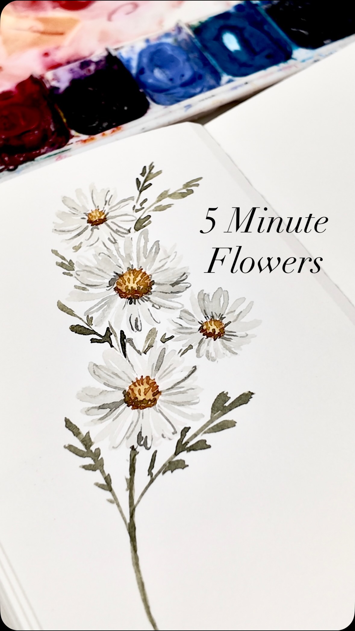 Only have 5 minutes to paint? Try these simple white wildflowers! The key to painting white flowers is using a very light wash of grey (use a consistency that has more water than paint). Create more detail in the centres of the flowers and add slightly darker grey shadows on the petals to really make them pop! They don’t have to be perfect. Keep them loose and have fun!