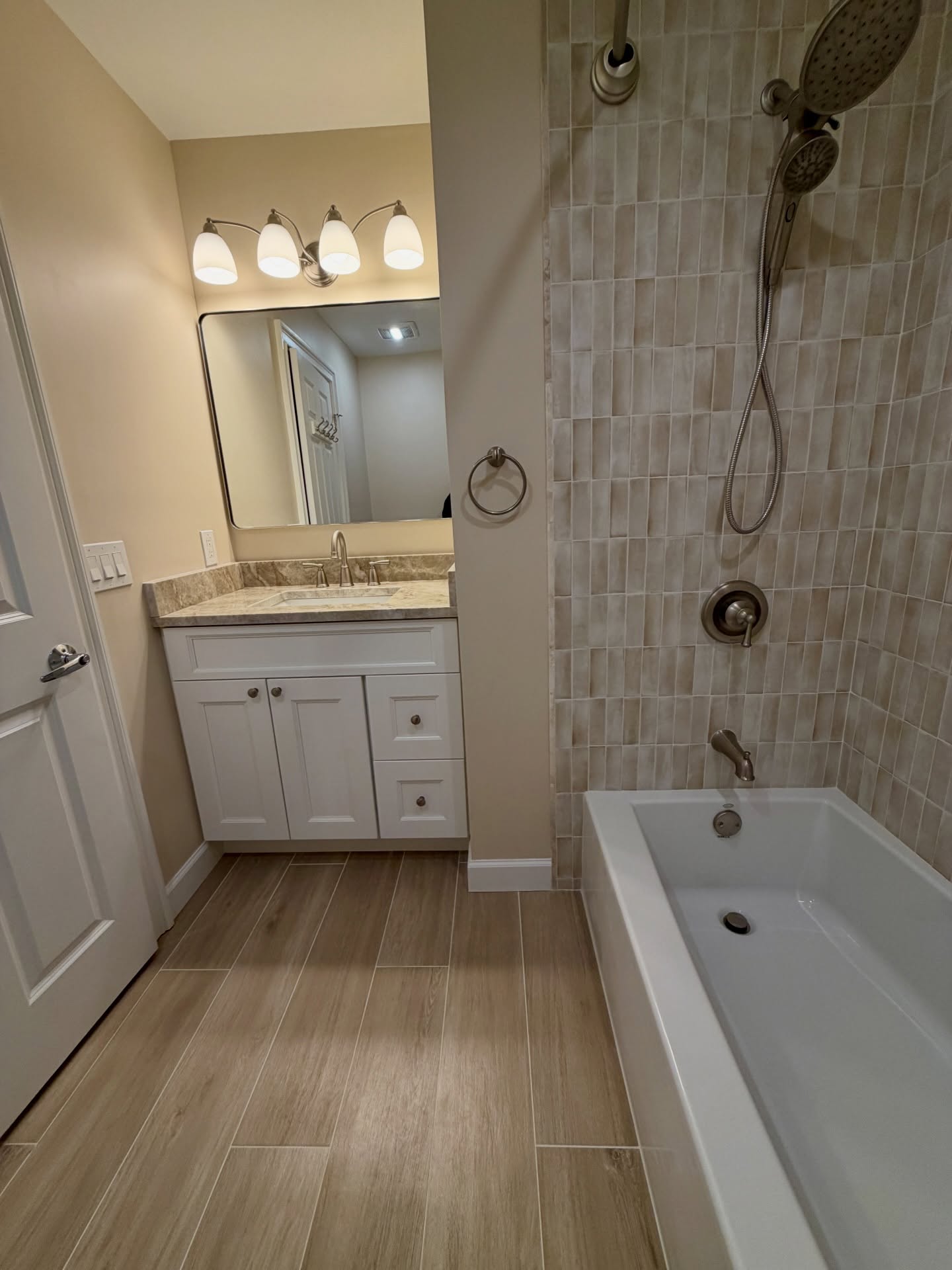 We redesign homes for how people live....NOT for Pinterest!
This hallway bathroom was gutted and rebuilt - keeping the layout the same - but making everything brand new! Bright... yet warm and rich with material selections, and functional for when her adult children are back home visiting!
Features:
✨Vertically stacked tile on the tub walls with a wood look tile from @thetileshop
✨Beautiful @fabuwood vanity with Taj Mahal stone from @jfgraniteandmarble
✨All fixtures complimenting the overall design from @moeninc
✨designed by @jonnaannesolimine and built by @soliminecontractingllc 😉
So what are you waiting for? Let's build something beautiful together! 203-778-9385